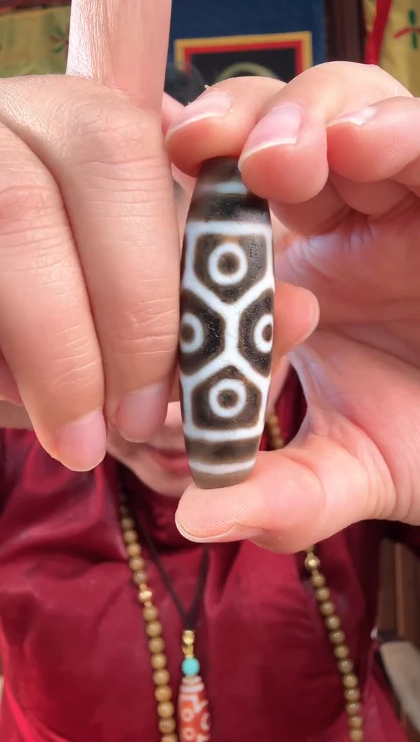 无非金属藏地牙9眼古珠