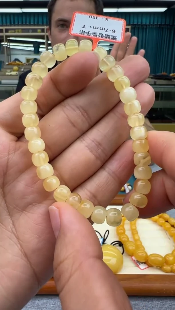 未镶嵌琥珀手链5秒拍号 假一罚三