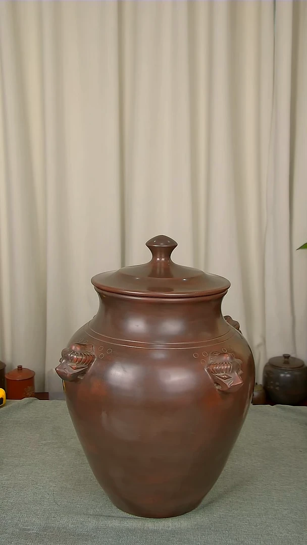 坭兴陶四面兽头罐