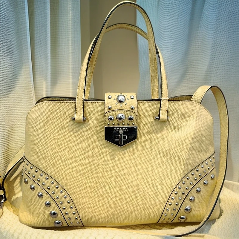 95新 Prada/普拉达 黄色铆钉手提单肩包1188 3498