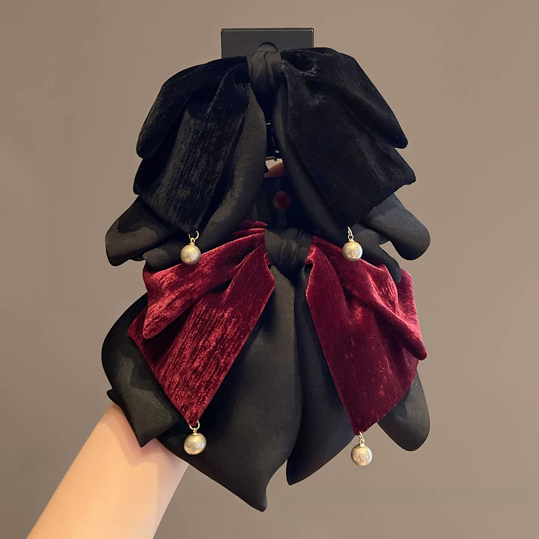 韩国丝绒蝴蝶结珍珠飘带抓夹女2025新款高级感马尾夹后脑勺鲨鱼夹