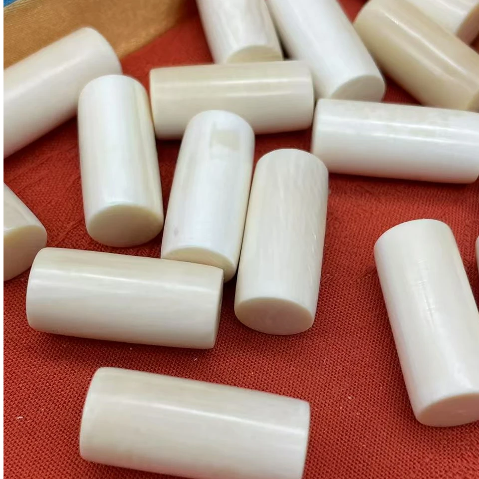 80058【特价瑕疵品】精品猛犸象牙22*10左右圆柱挂件（发其一）