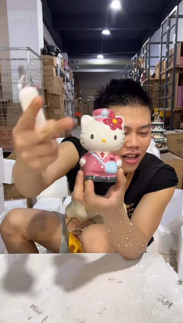 瓷片粉色邮递员kt存钱罐