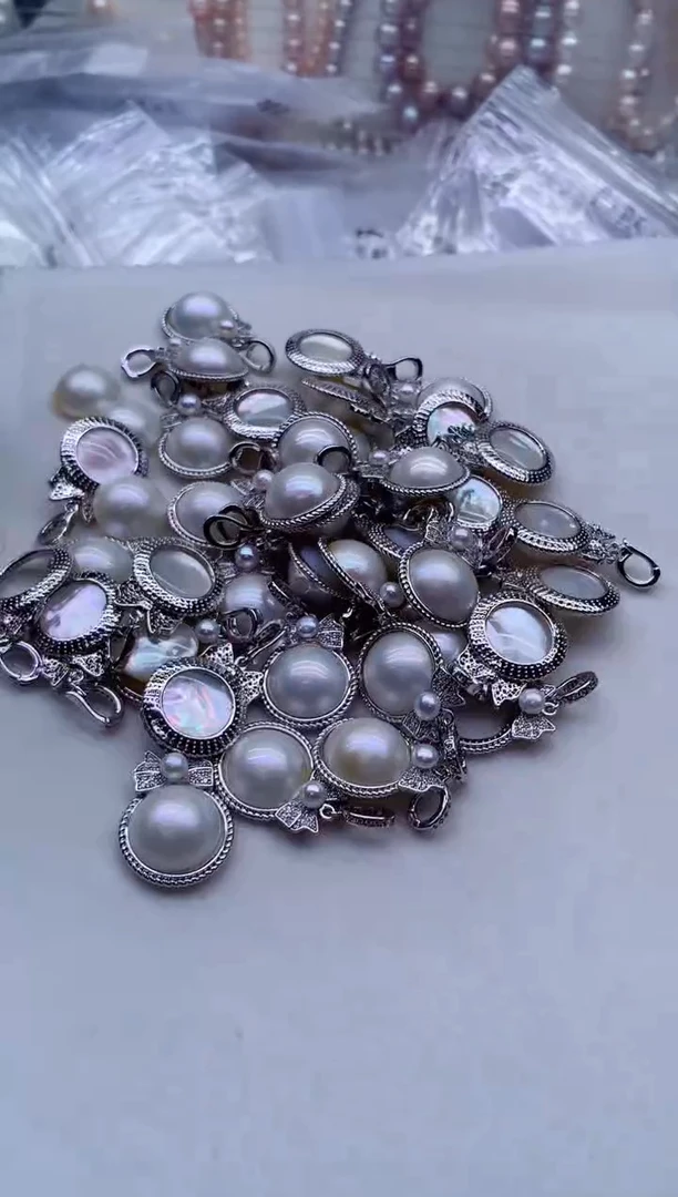 合金拼合珍珠（马贝珠）吊坠(不含链)多样性发其一，非无暇