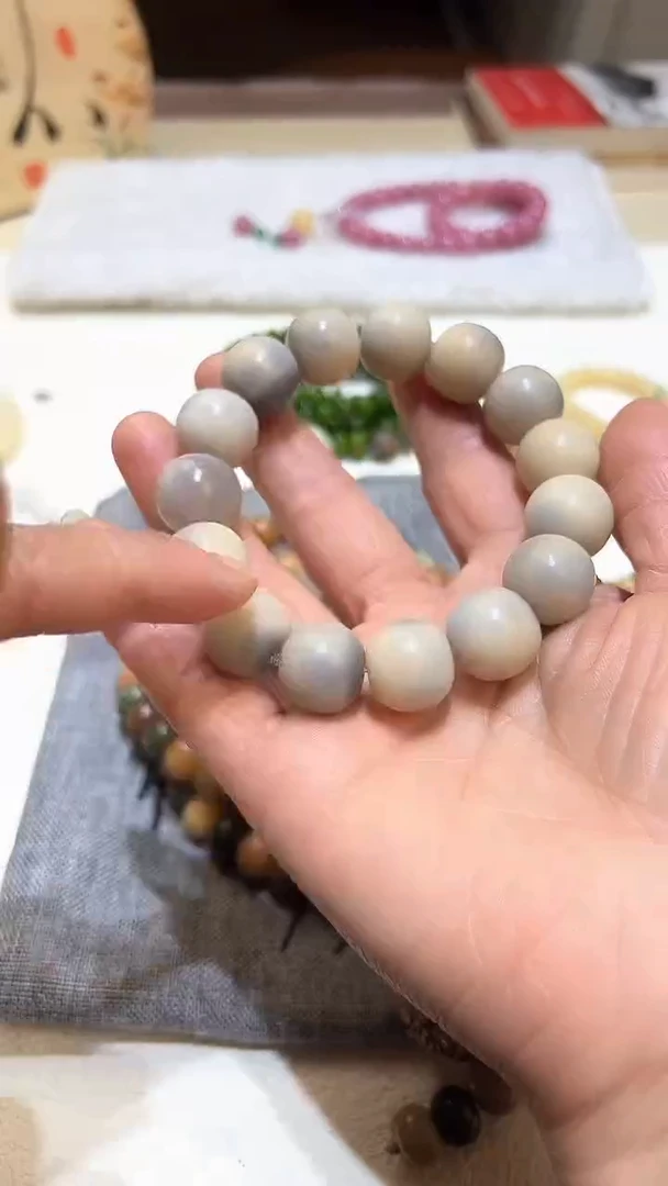 吊坠菩提根/象牙果14*15紫色飘花手串