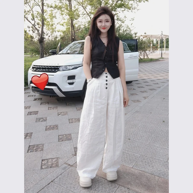 今年流行的漂亮夏装2025新款干练气质女装黑色马甲阔腿裤两件套装