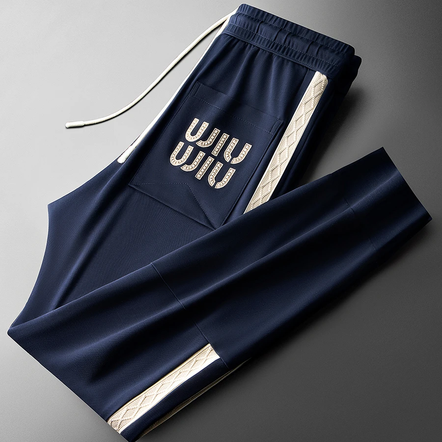 玛加西曼特春夏时尚潮流撞色织带裤子男士修身运动小脚休闲裤男