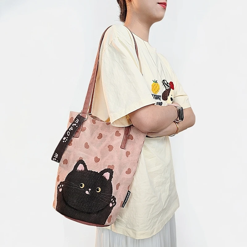 弘娜原创新款黑猫印花单肩包斜挎休闲水桶包单肩包可爱通勤女包AI