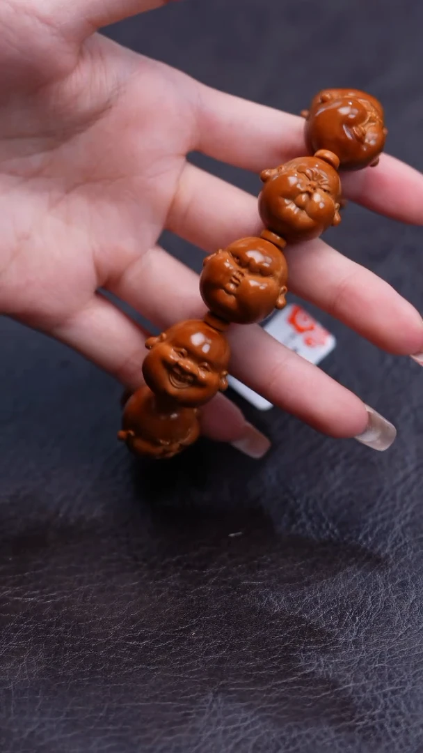 橄榄核吊坠人生百态