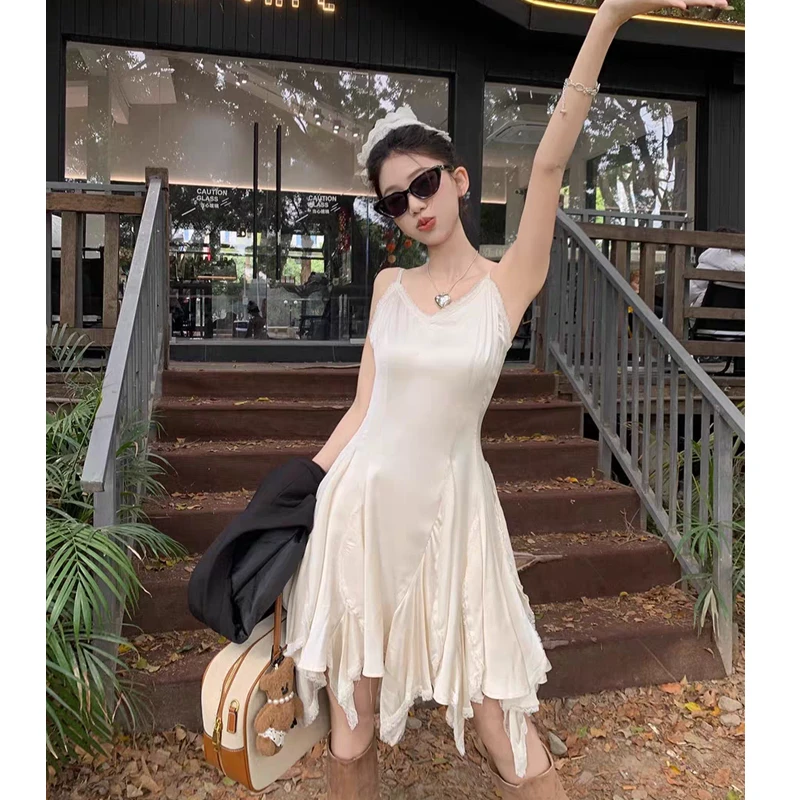 法式蕾丝荷叶边白色吊带连衣裙女夏季气质海边度假风辣妹沙滩短裙