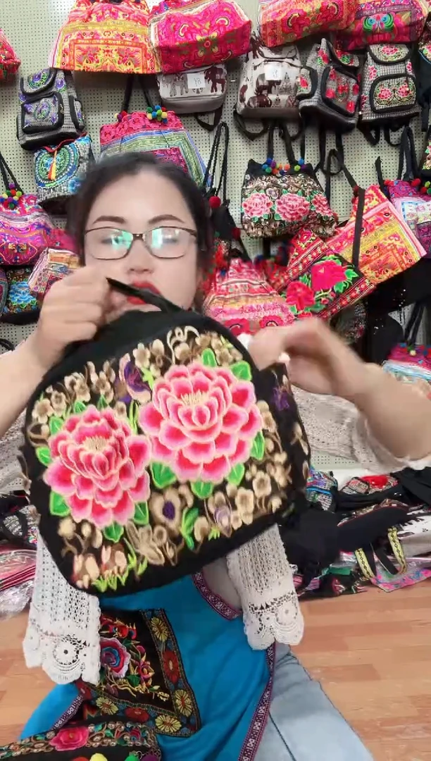 帆布斜挎手提两用包包