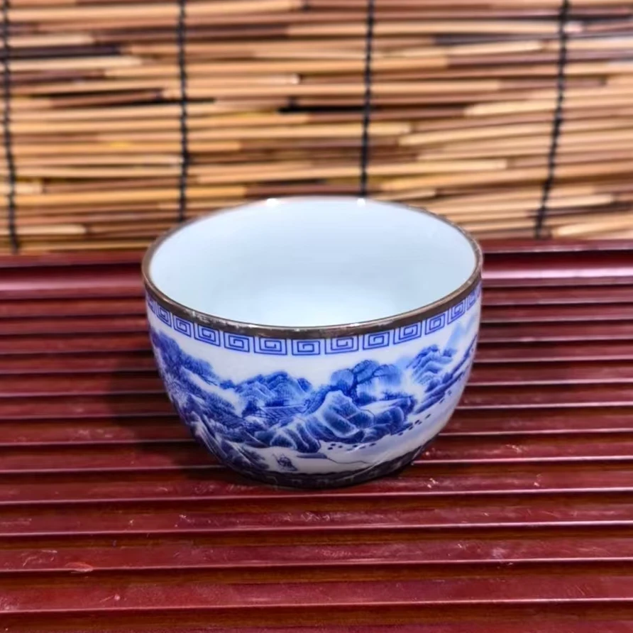 61 白瓷山水主人杯