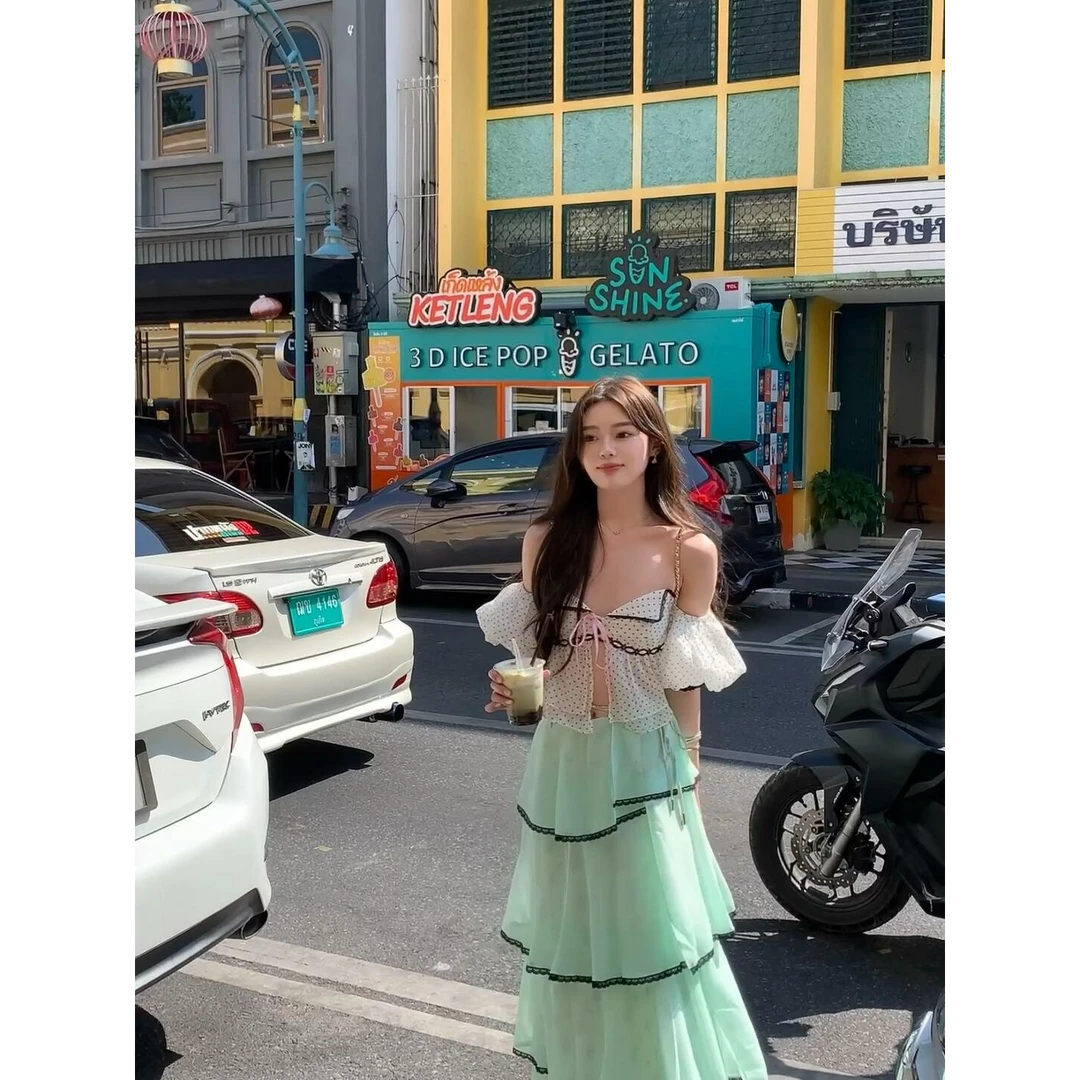 今年流行超好看荷叶边薄荷绿大裙摆a字蛋糕半身裙吊带上衣两件套