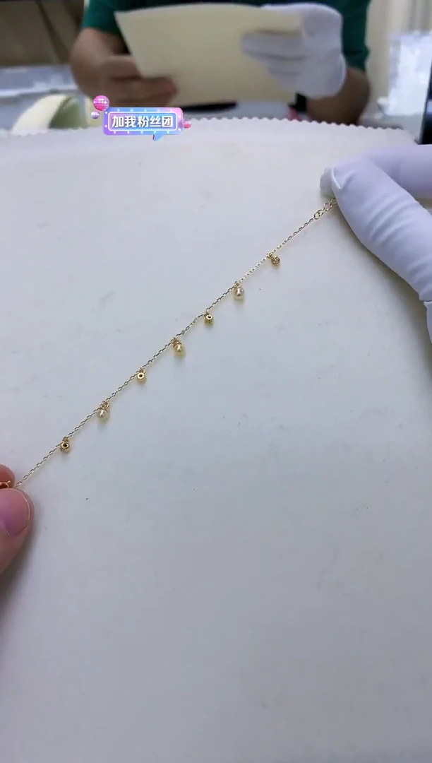 银S925镶嵌饰品海水珍珠羽皇金设计款手链
