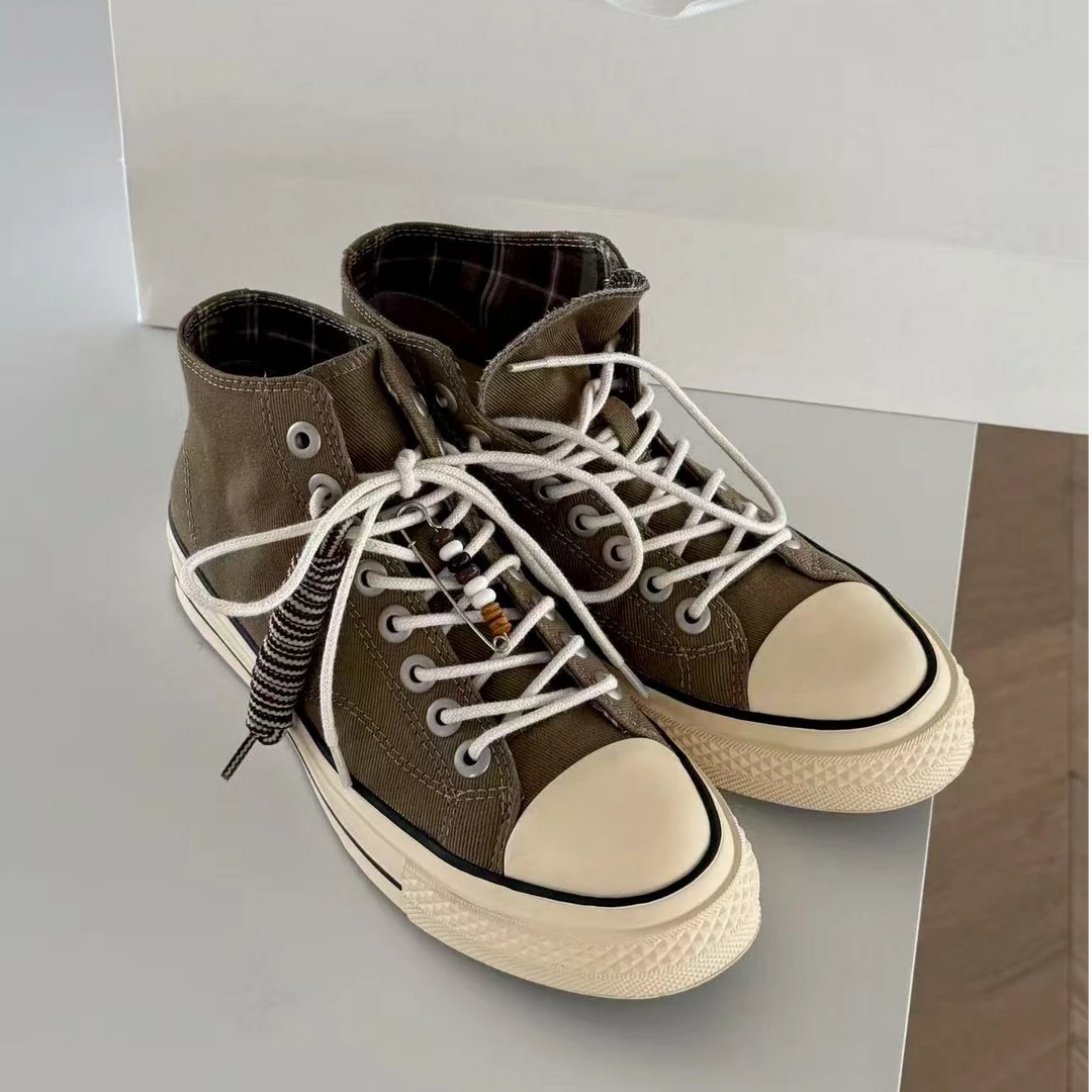 诗歌兰帆布鞋2025秋新款真皮拼色休闲舒适系带百搭运动板鞋高帮鞋
