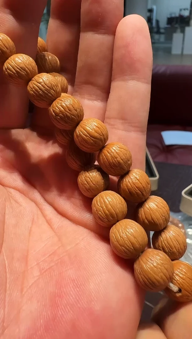 猴头核桃手串凤羽体验手持11mm+