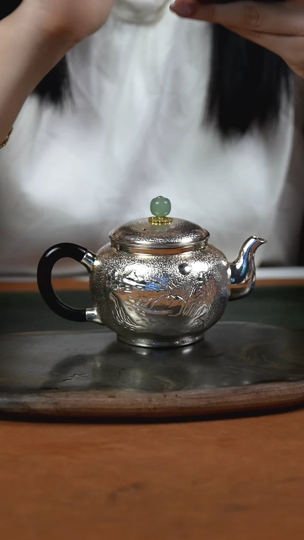 手工锤纹山水泡茶壶
