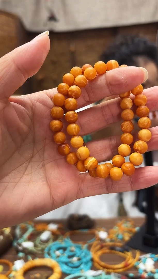 未镶嵌琥珀裸石多样性发一件 8+   橘皮花蜡手串