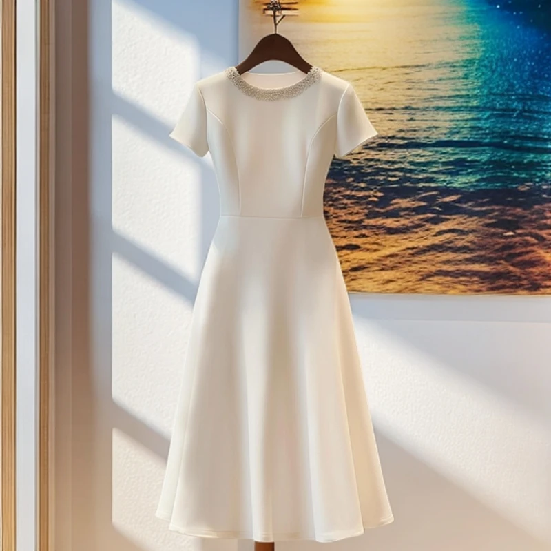 新款夏天绝色圆领白色别致端庄设计师款小众连衣裙子女装大气