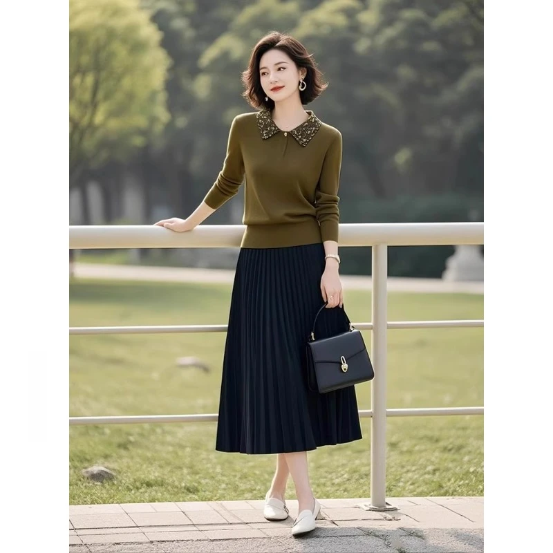 今年流行的针织套装女装2025春季新款polo领上衣百褶半身裙两件套