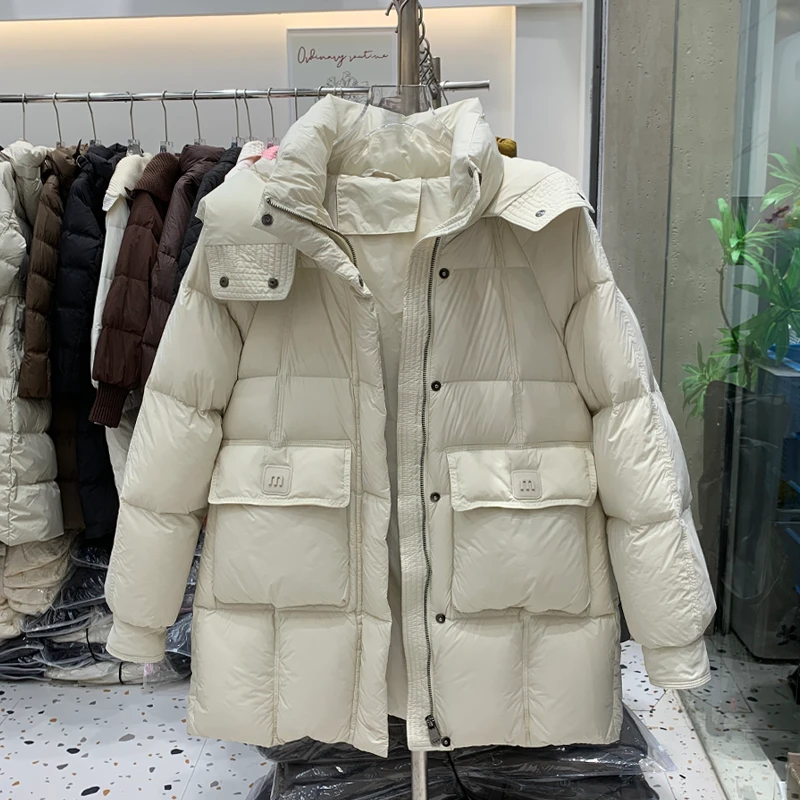 泡芙雪球2.0新国标90白鸭绒羽绒服女中长款新款保暖连帽加厚外套