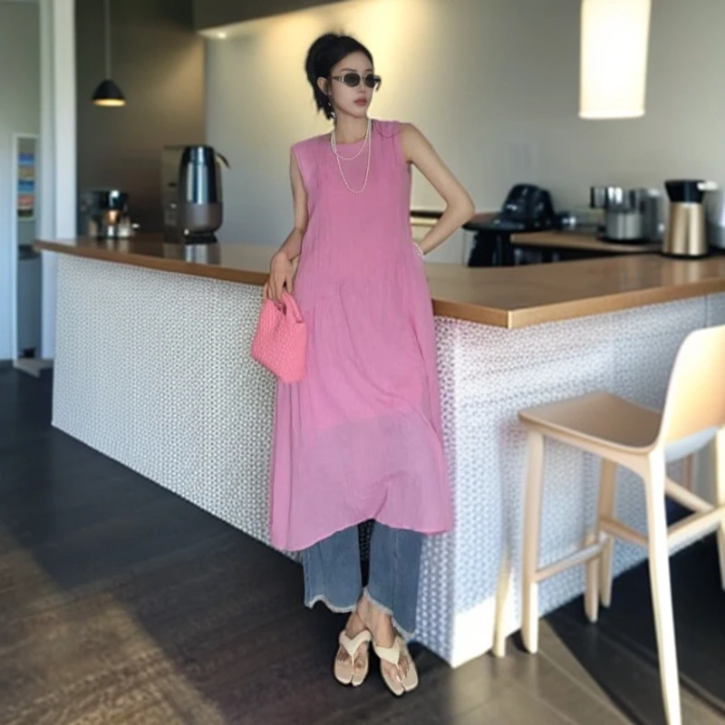 纯欲慵懒风棉麻粉红裙2025爆款千金清冷感温婉大方粉红背心连衣裙