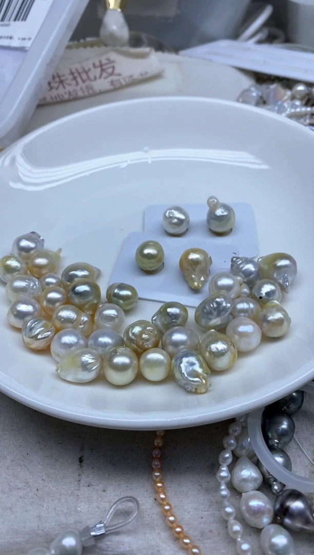 海水珍珠裸珠H****學半孔发1颗