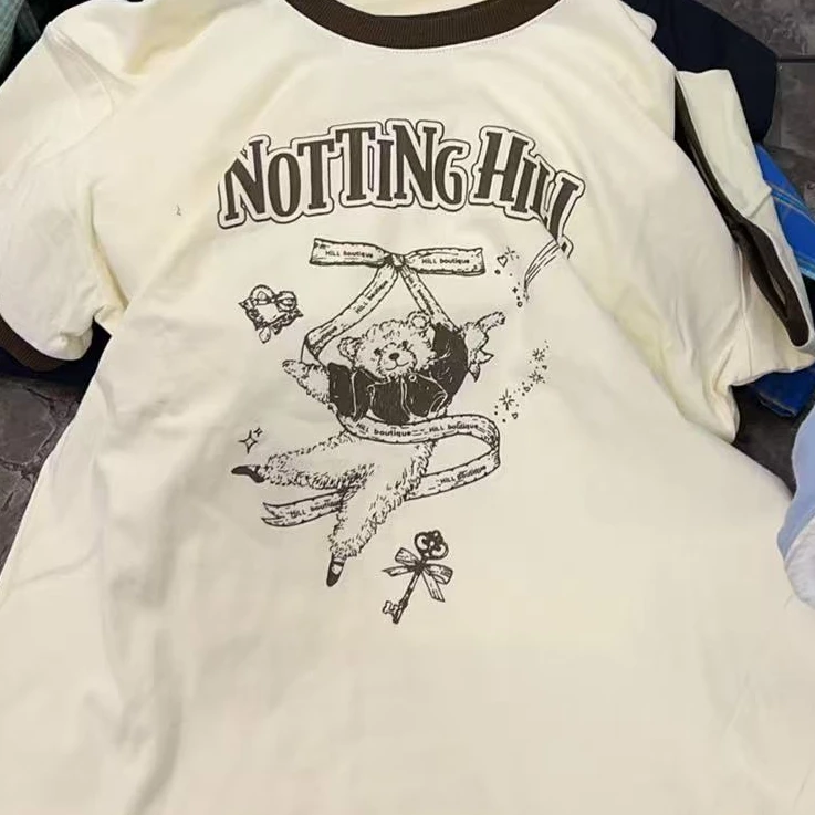 【NO退NO换】韩国东大门2025春款米白色蝴蝶结跳舞小熊T