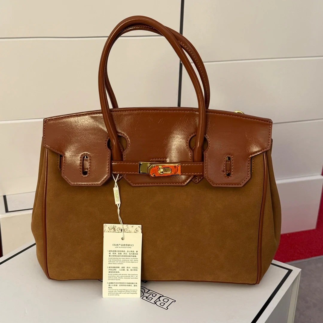 美拉德大容量绒面手提包F009