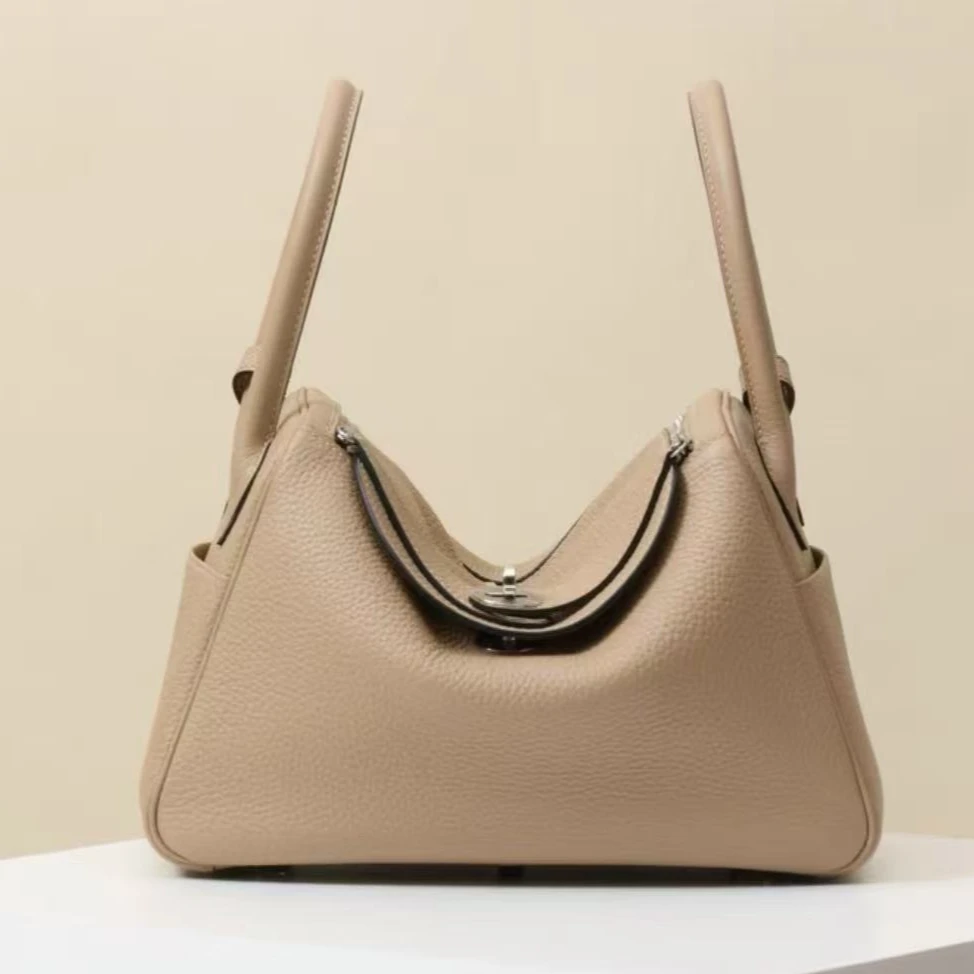 99新 Hermes/爱马仕 lindy34风衣灰银扣框k 9249091 手提包