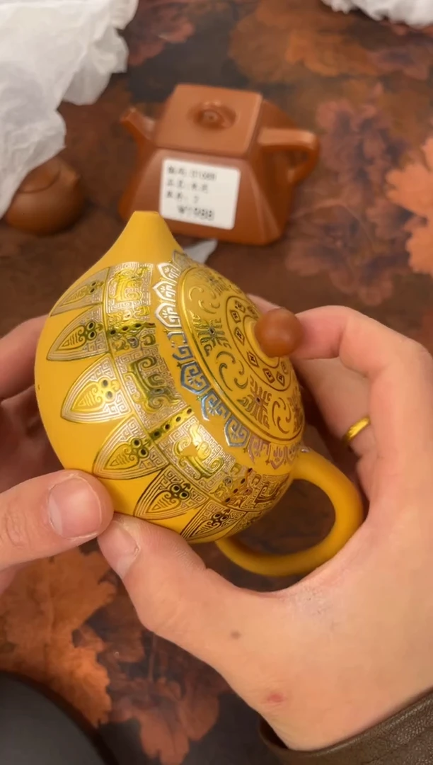 茶杯紫砂-八宝禅意纹黄段西施