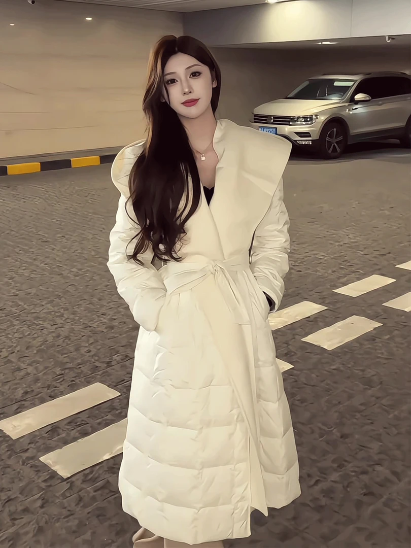 高级感白色连帽棉服女款冬季巨好看宽松系带收腰保暖长款过膝外套