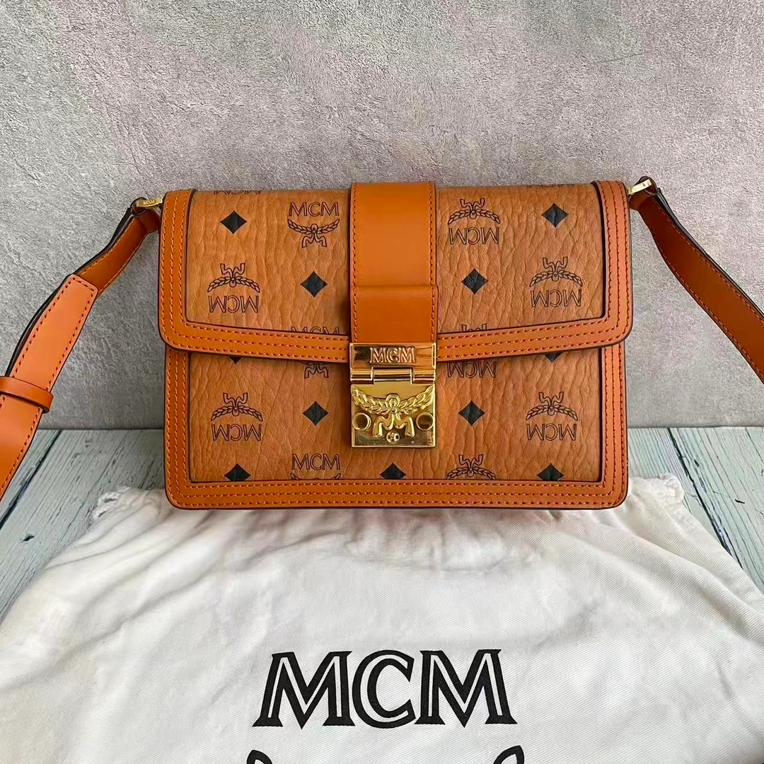 99新 MCM mcm干邑色tracy小号邮差斜挎包