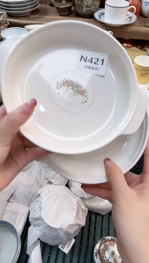 瓷片明****?    421