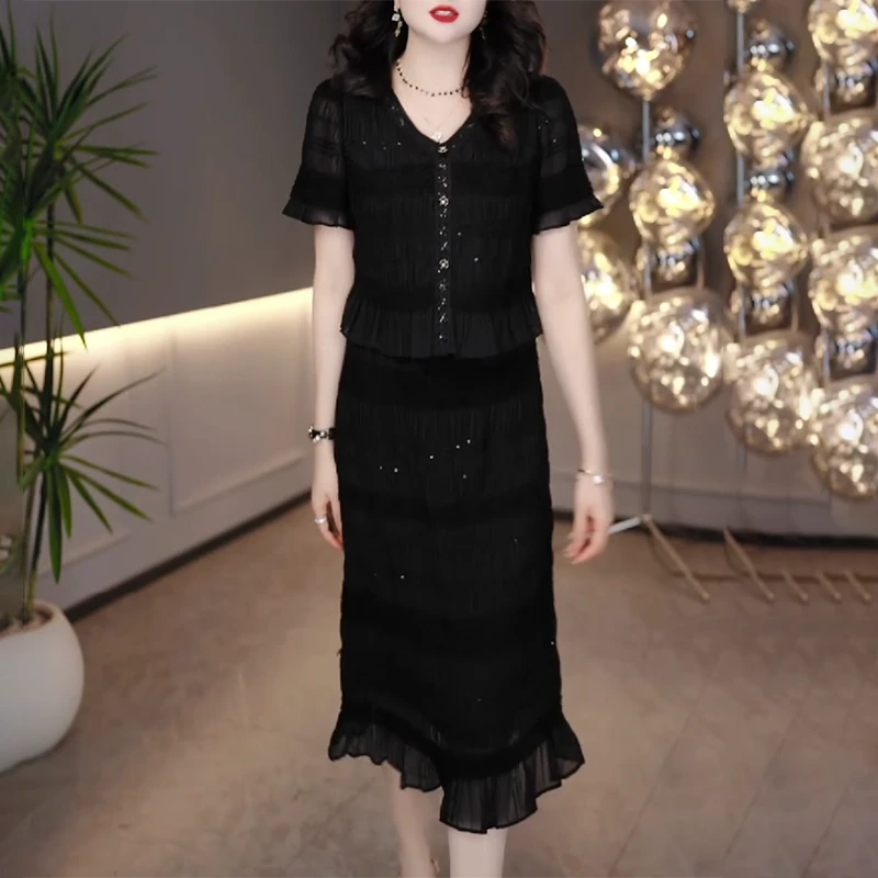 今年流行爆款气质黑色连衣裙女夏假两件短袖洋气减龄裙子#5129