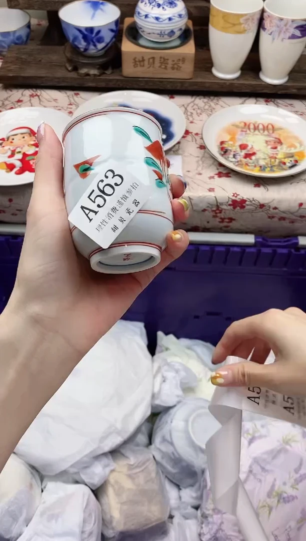 瓷片翟*卯     A563