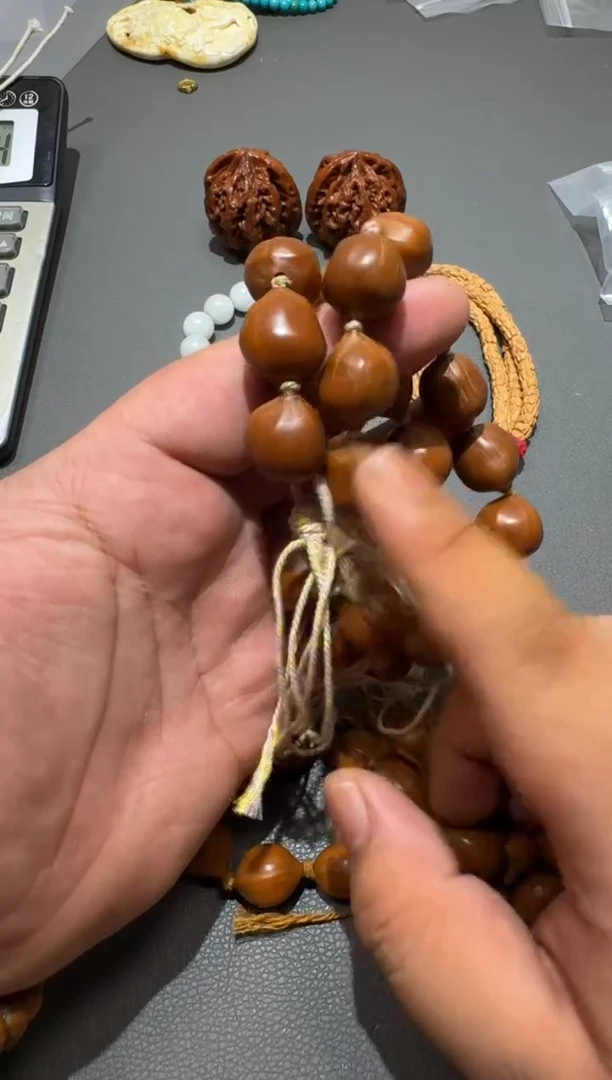 橄榄核吊坠手持单圈