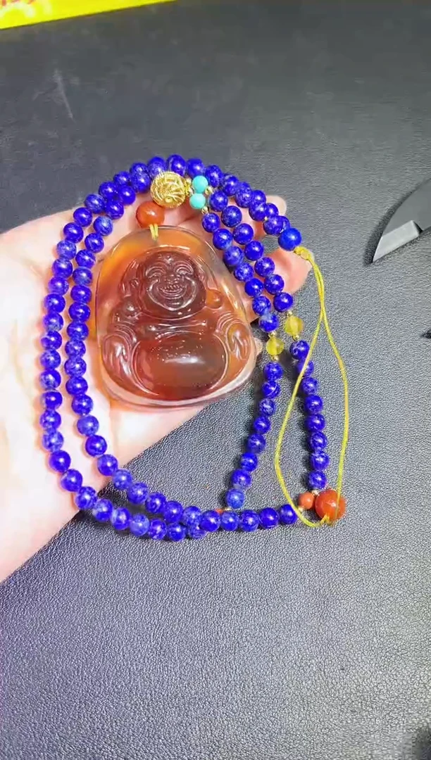 裸石琥珀未镶嵌唐*彪吊坠