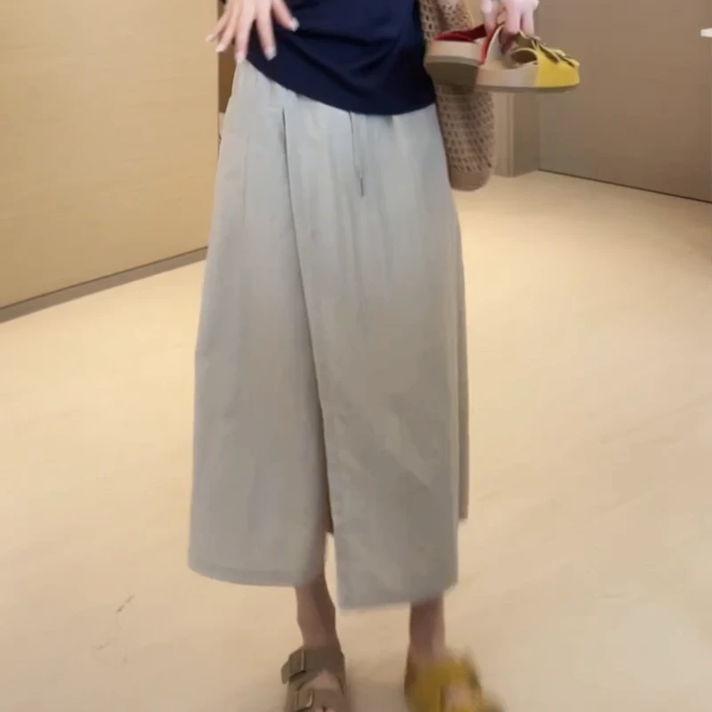 2025夏季女极简风高腰休闲百搭纯色松紧腰裙裤LK2503722