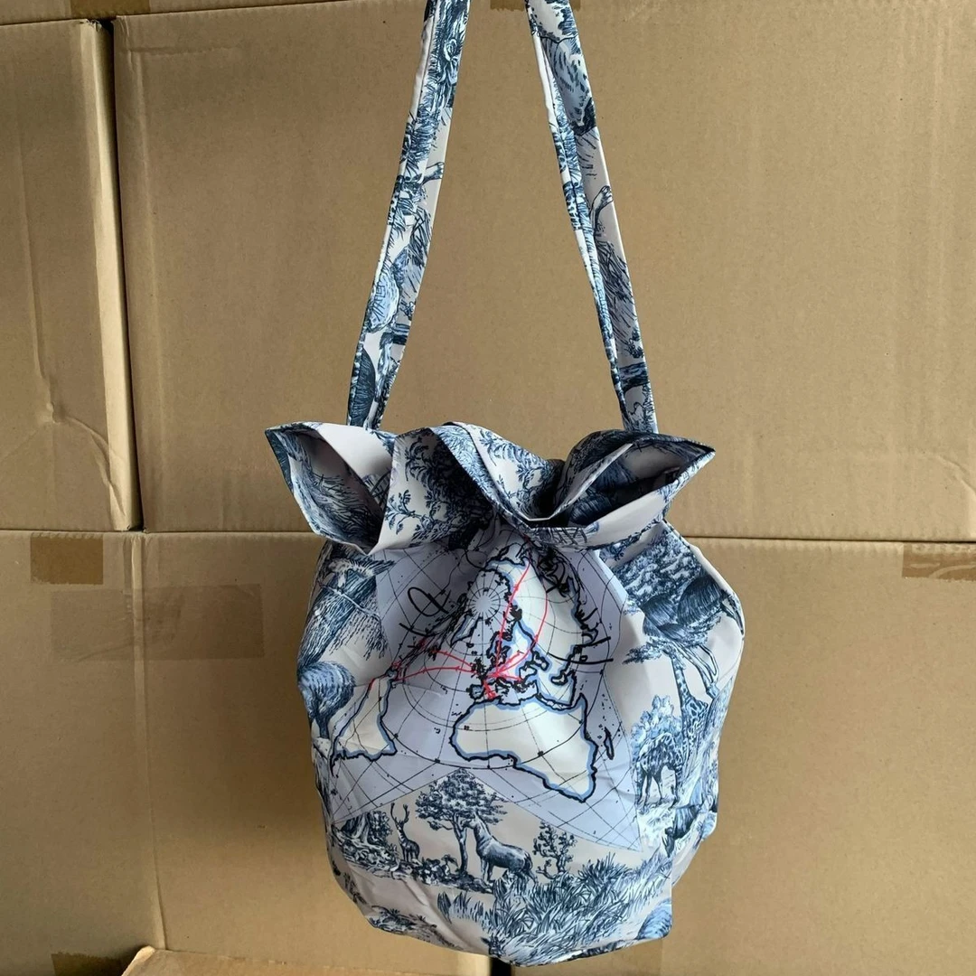 【A451】正版限定环球漫游系列抽绳束口水桶编织麻料 化妆包