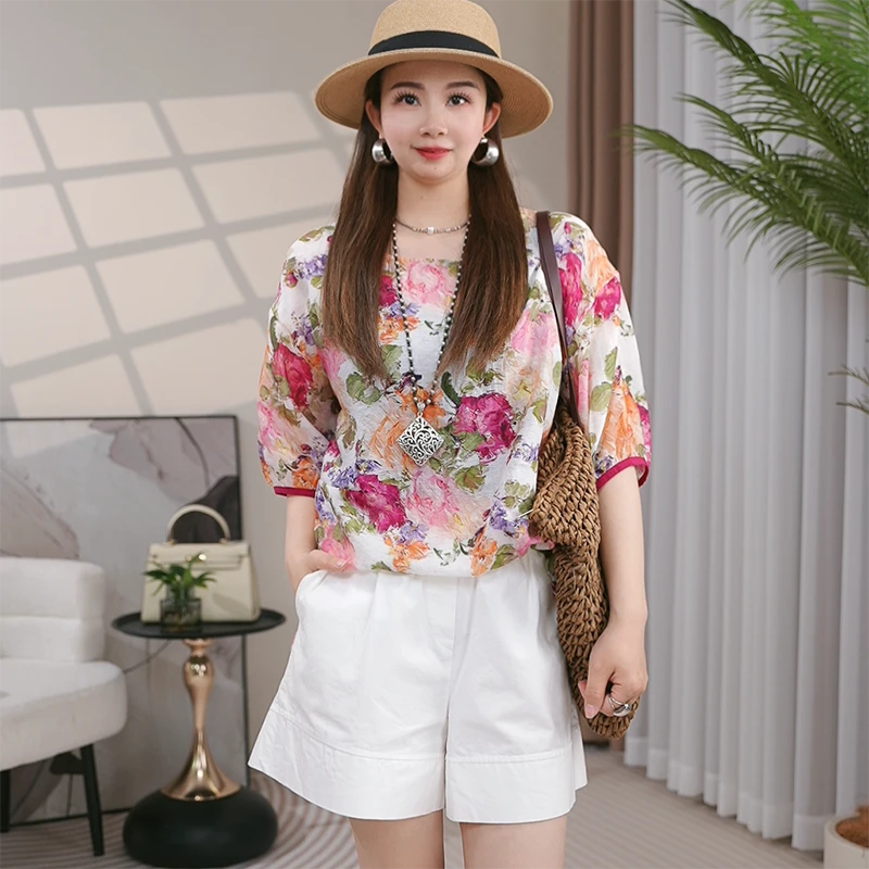 欧货重磅夏季洋气减龄短袖花朵上衣女2025高级感印花漂亮洋气小衫