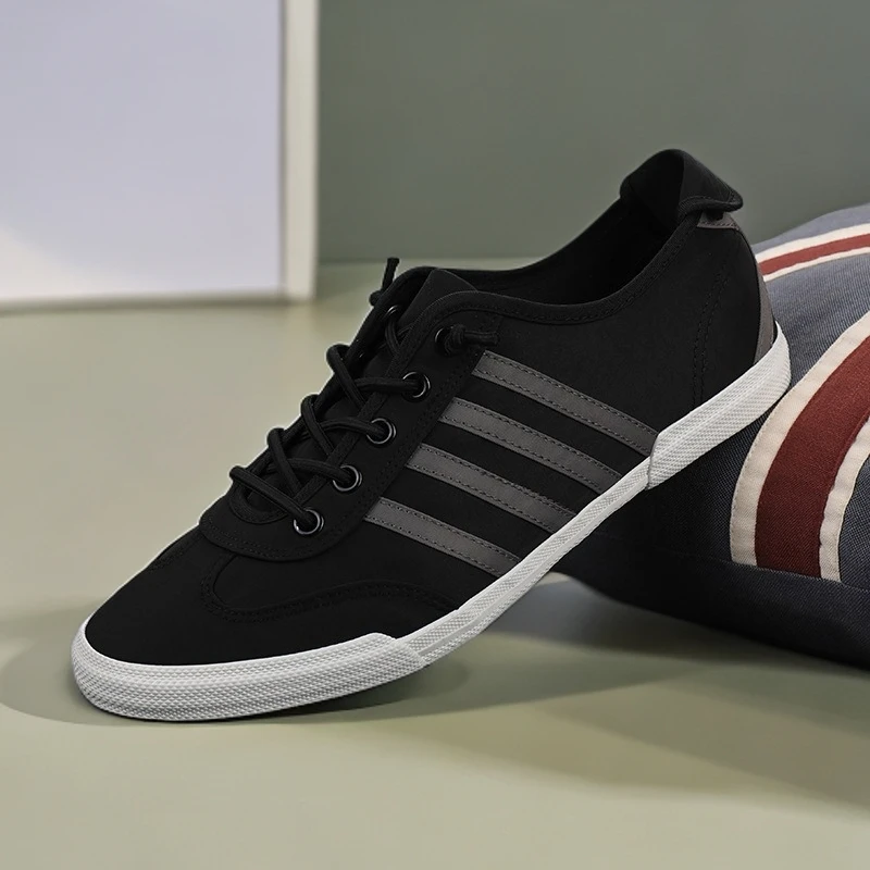 春季新款男鞋2021年韩版系带款休闲鞋潮流时尚帆布鞋男士板鞋