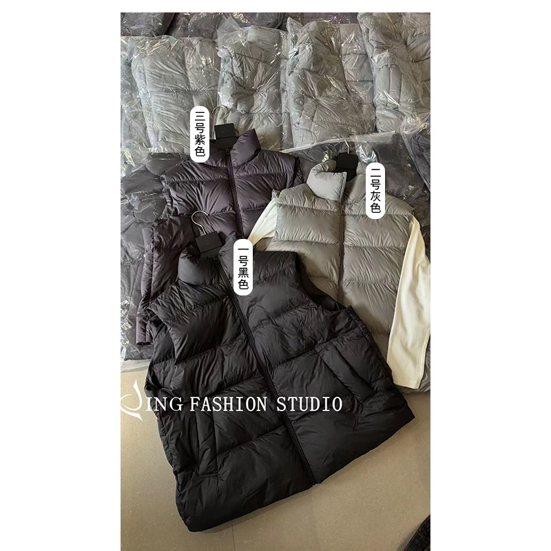 《越穿越喜欢》JING冬季新款33231宽松白鹅绒马甲女装保暖无袖马夹