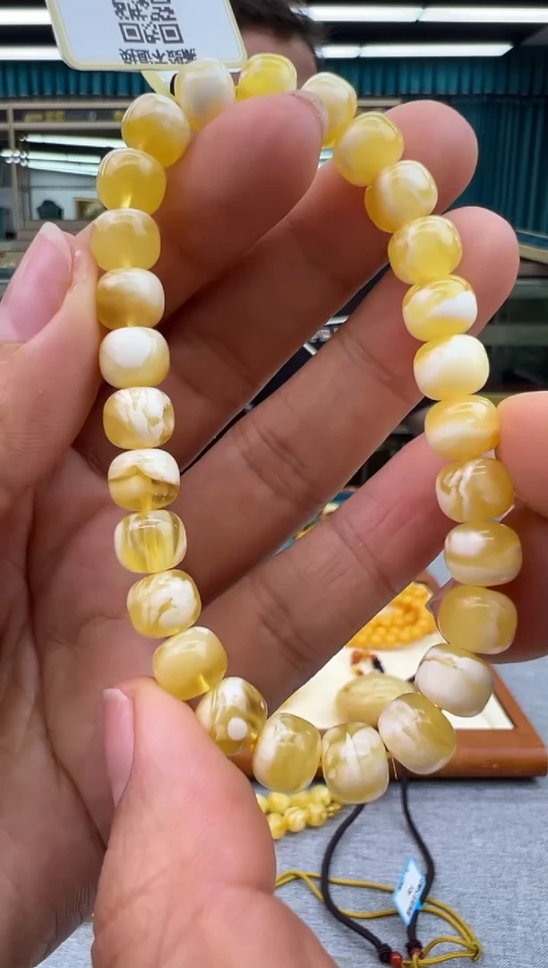 未镶嵌琥珀手链123秒拍号 假一罚三