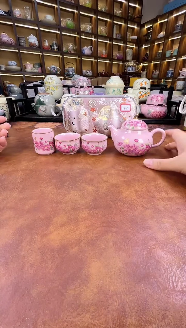瓷片粉色梨形手把壶旅行