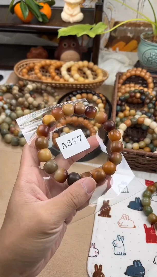 手串菩提根/象牙果14干磨孔一般a377