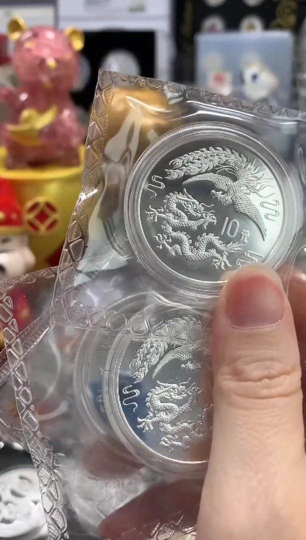 【闪购商品】纯银1990年龙凤银币1盎司带证