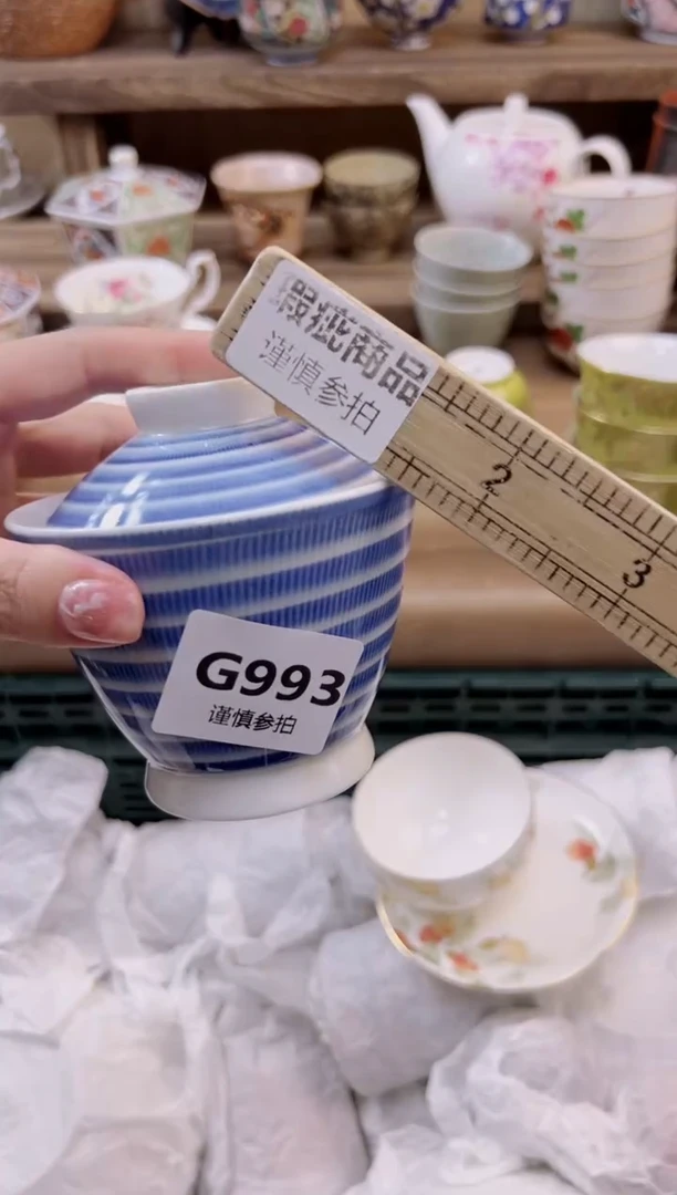 瓷片腊***丘           993