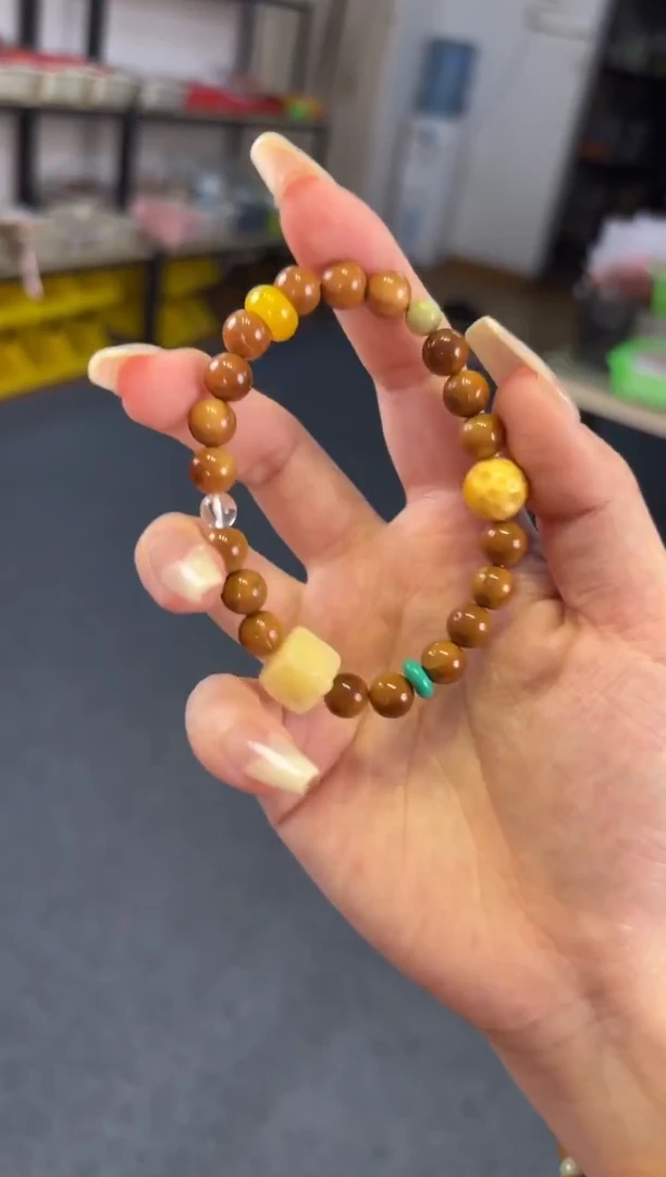 合金石英质玉（黄龙玉）手链     库克圆珠黄龙玉设计款
