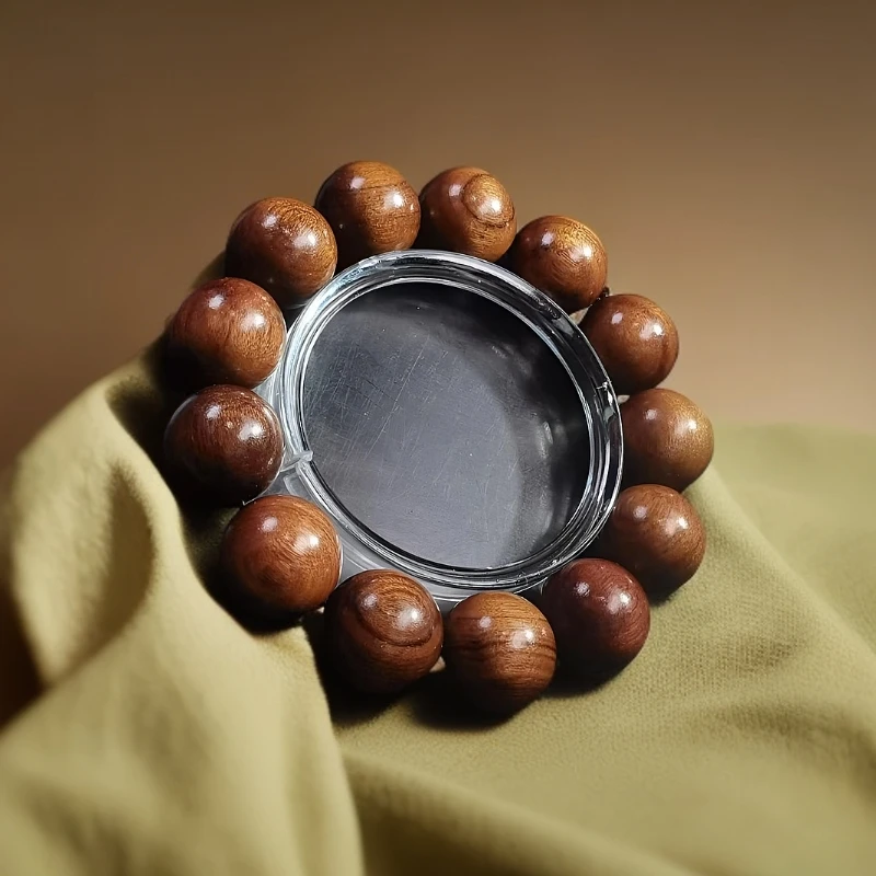 A503桃木黑油玉化卡1.8单圈手串